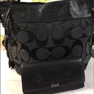 Black stunning coach purse